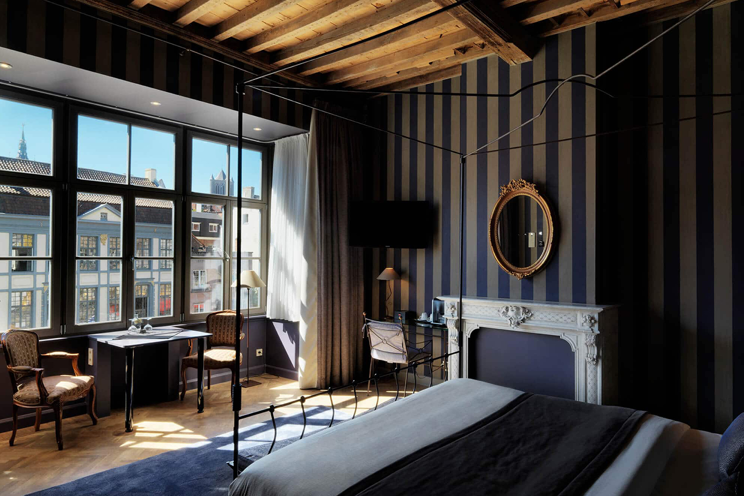 Les meilleurs hôtels à Gand ou Gent en Belgique : Chambre chaleureuse avec vue sur la ville dans l'hôtel Harmony